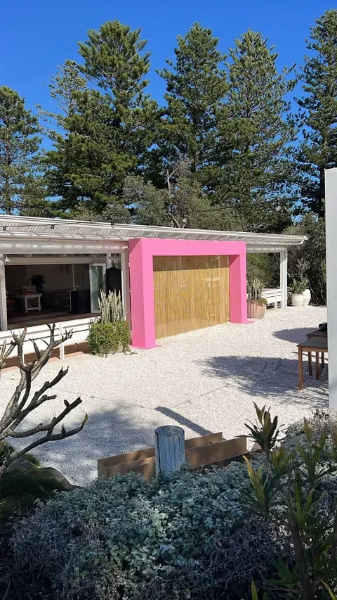 Pink joinery project in the wider courtyard